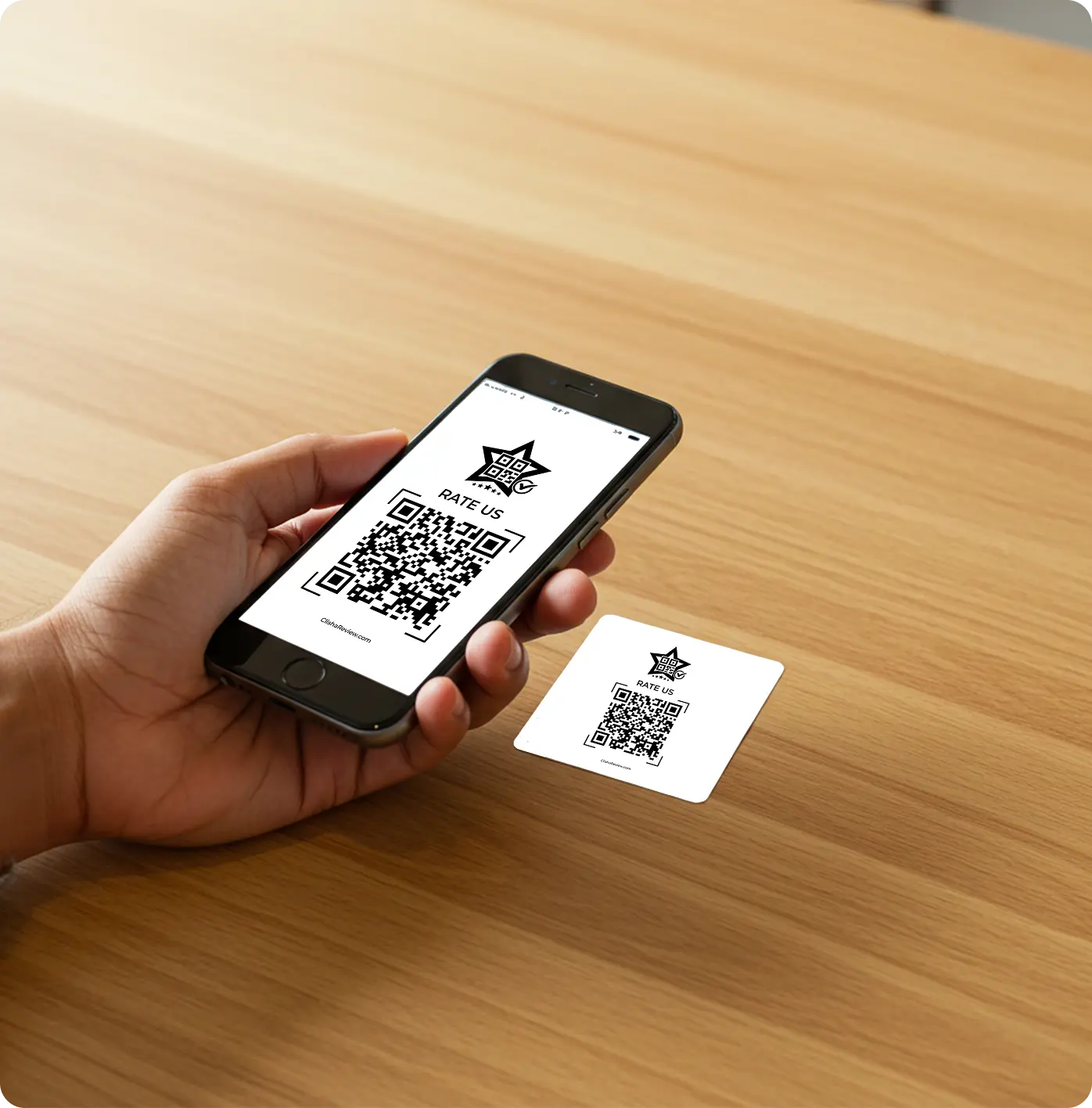 Hand holding smartphone scanning QR code